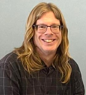 Dr Jonathan E. Tomlinson