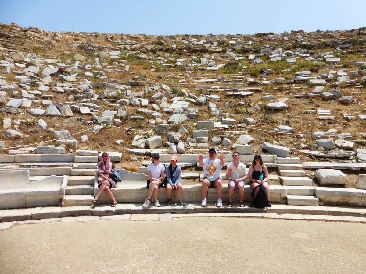 Students at the ancient theater, Delos